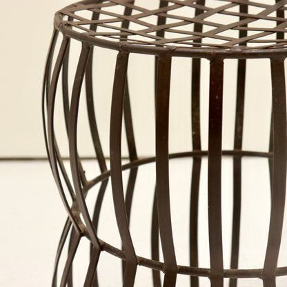 Detail of hand-forged strap joint with visible hammer marks.