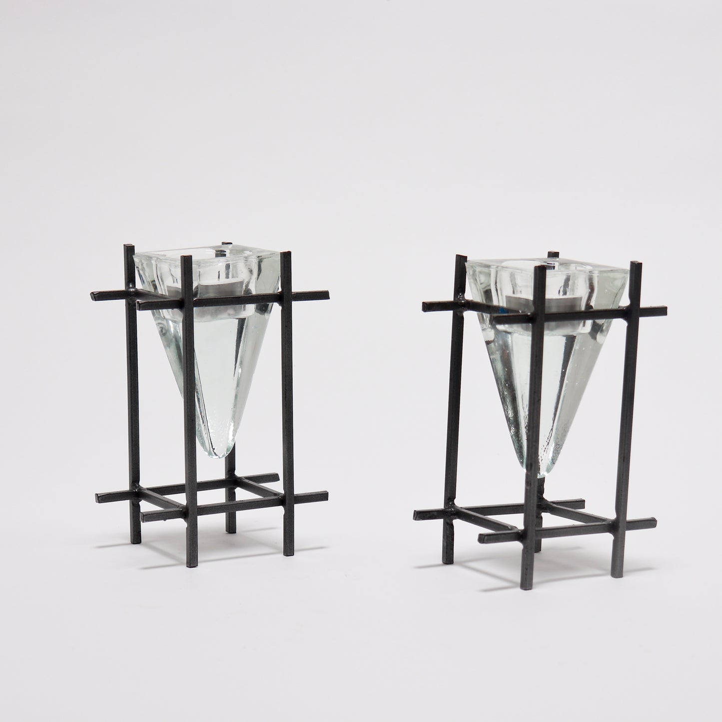Sculptural brutalist tealight holders with glass cone