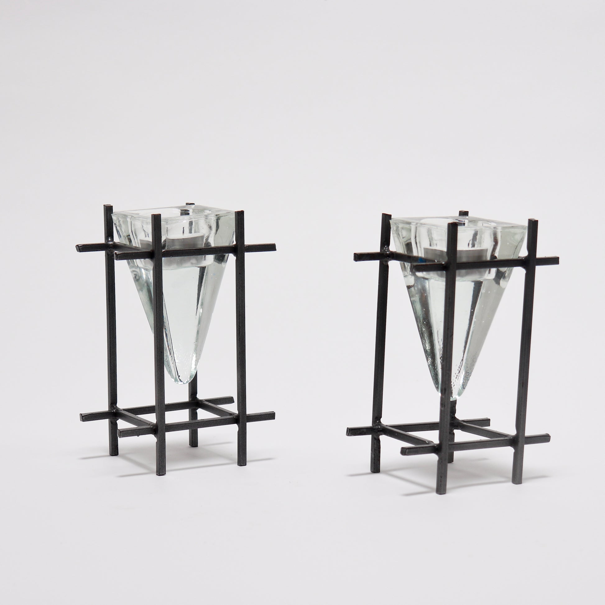Sculptural brutalist tealight holders with glass cone