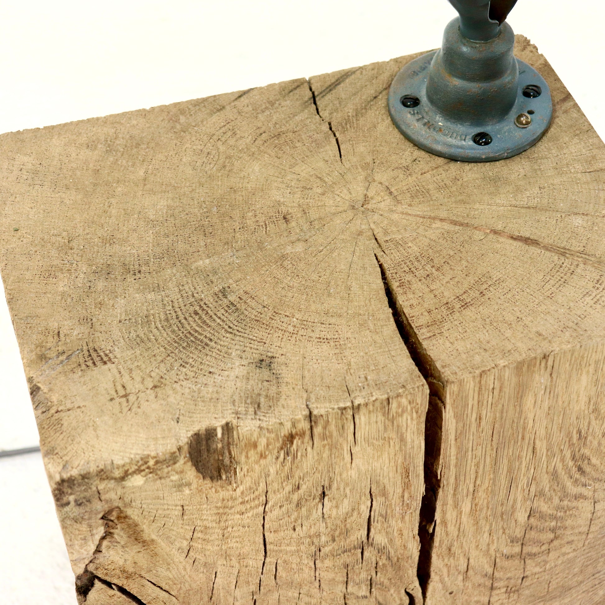 Oak block base with visible grain and natural cracks
