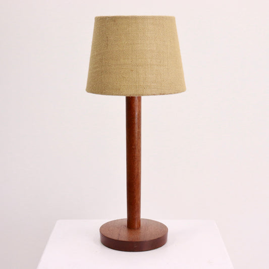 “Mid-century teak table lamp with hessian shade, front view”