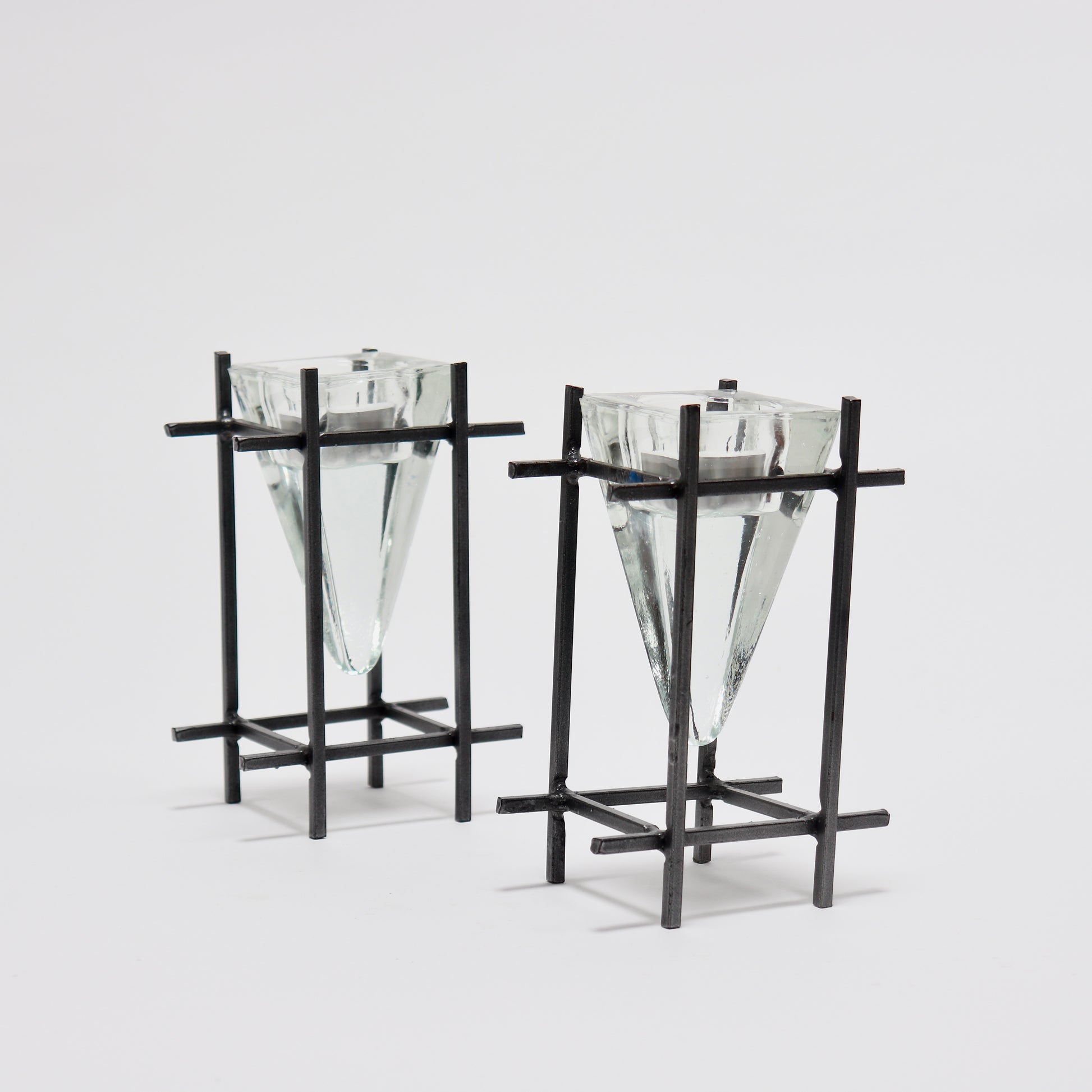 Pair of brutalist steel and glass prism tealight candle holders