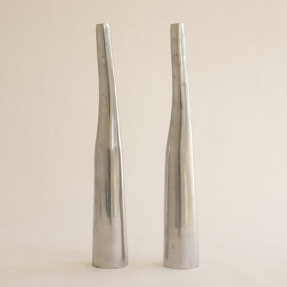 Sculptural aluminium vases with tapered silhouette