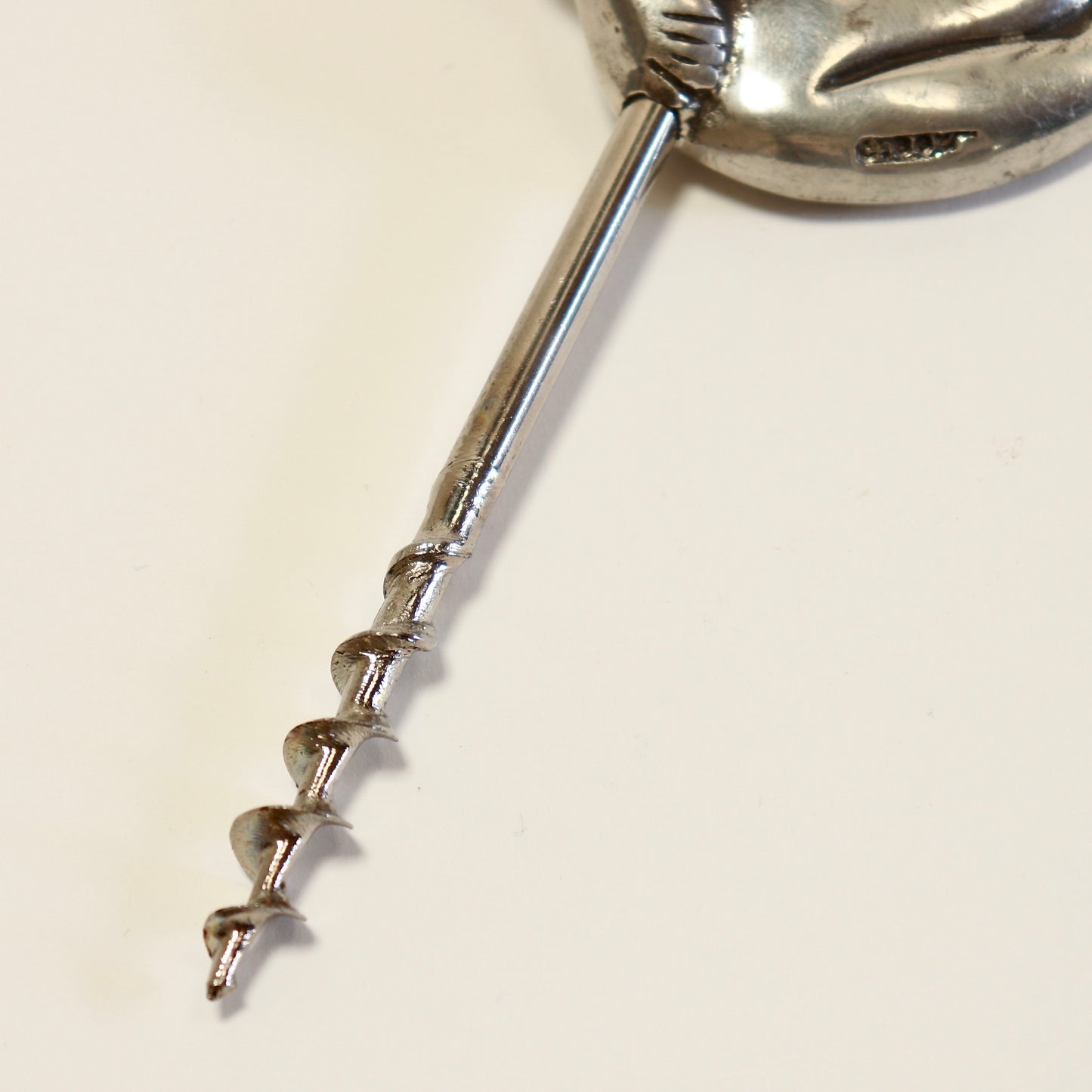 Collectible pewter bottle opener by Carol Boyes