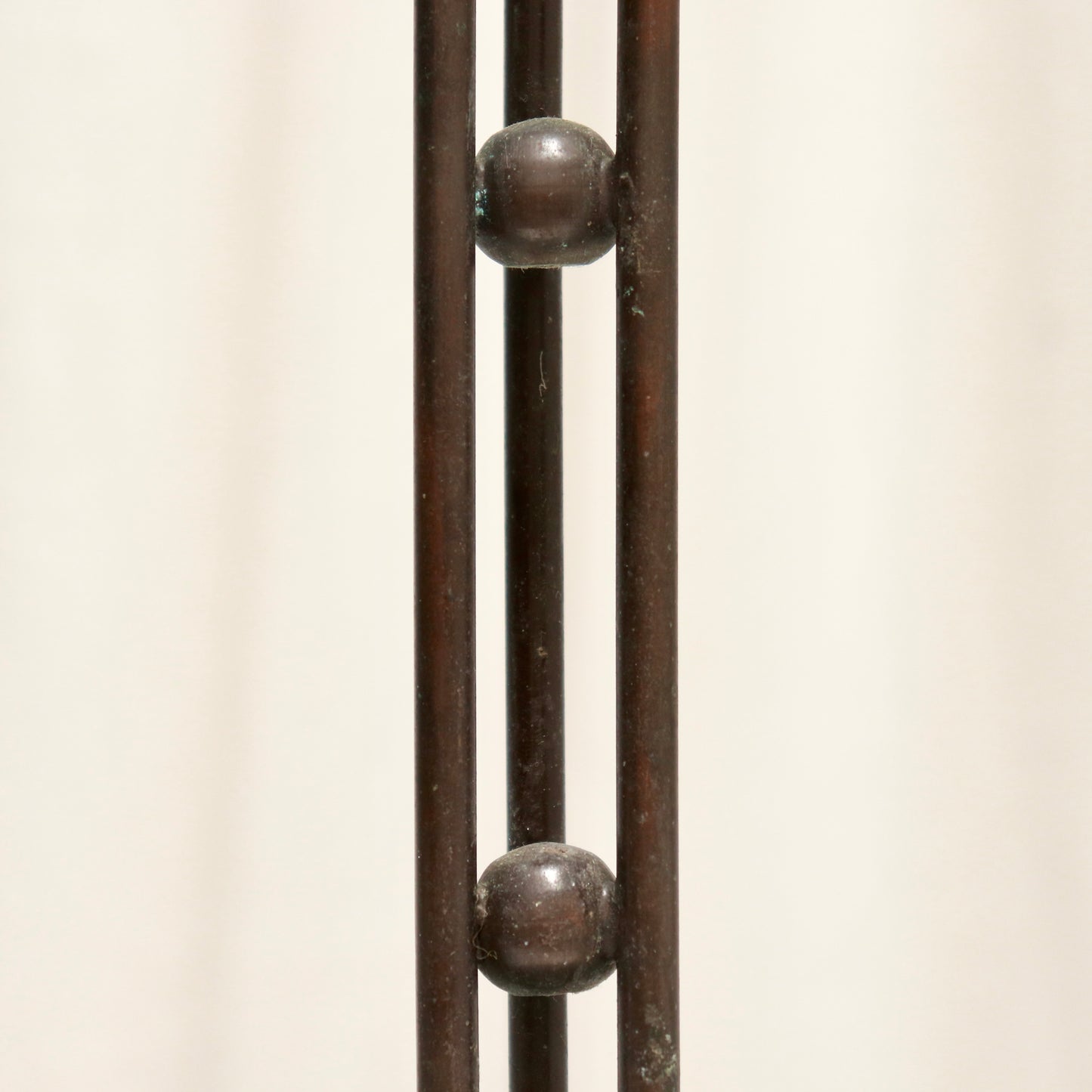 Triple-rod column with spherical spacers.