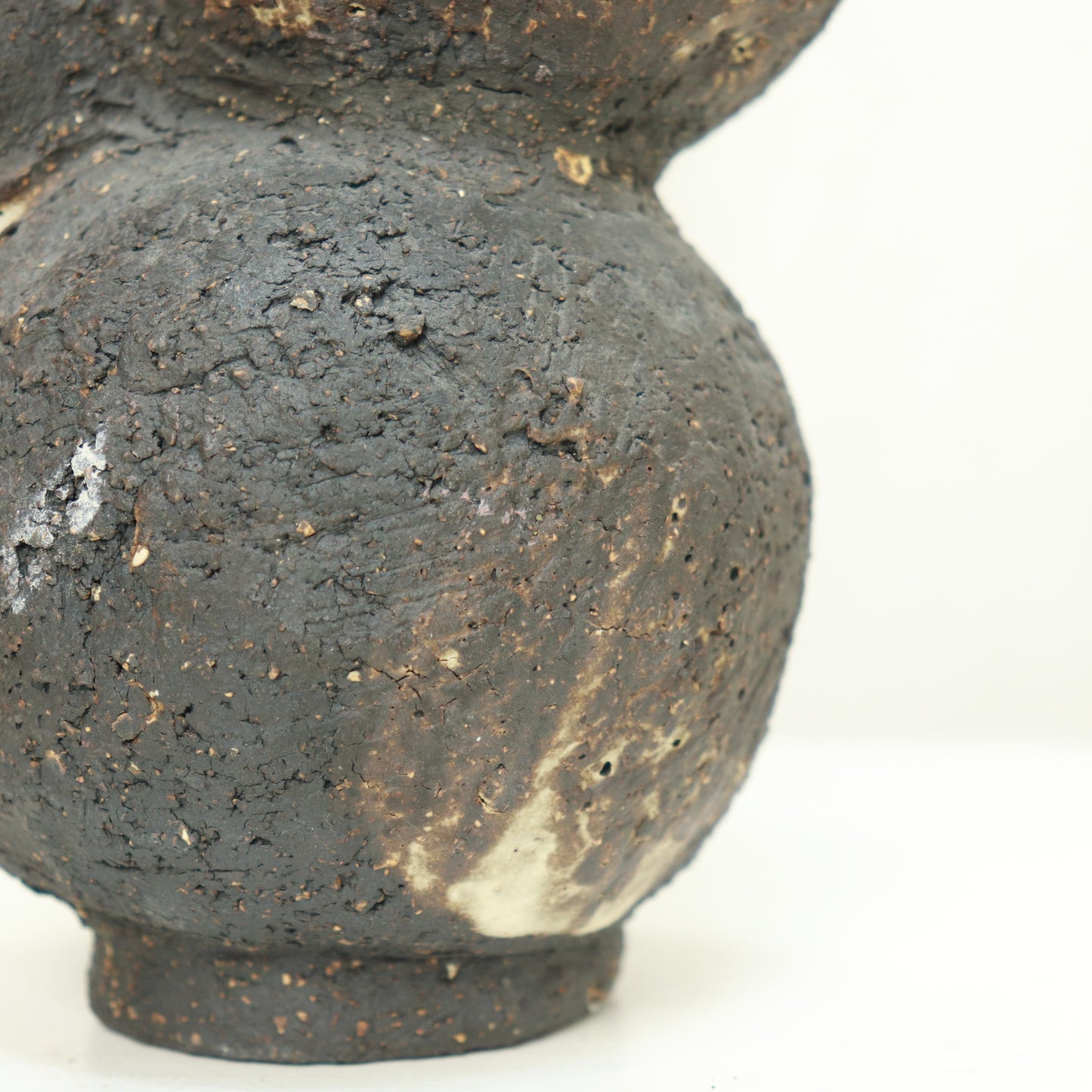 Detail of organic bulb formation on studio-made vase
