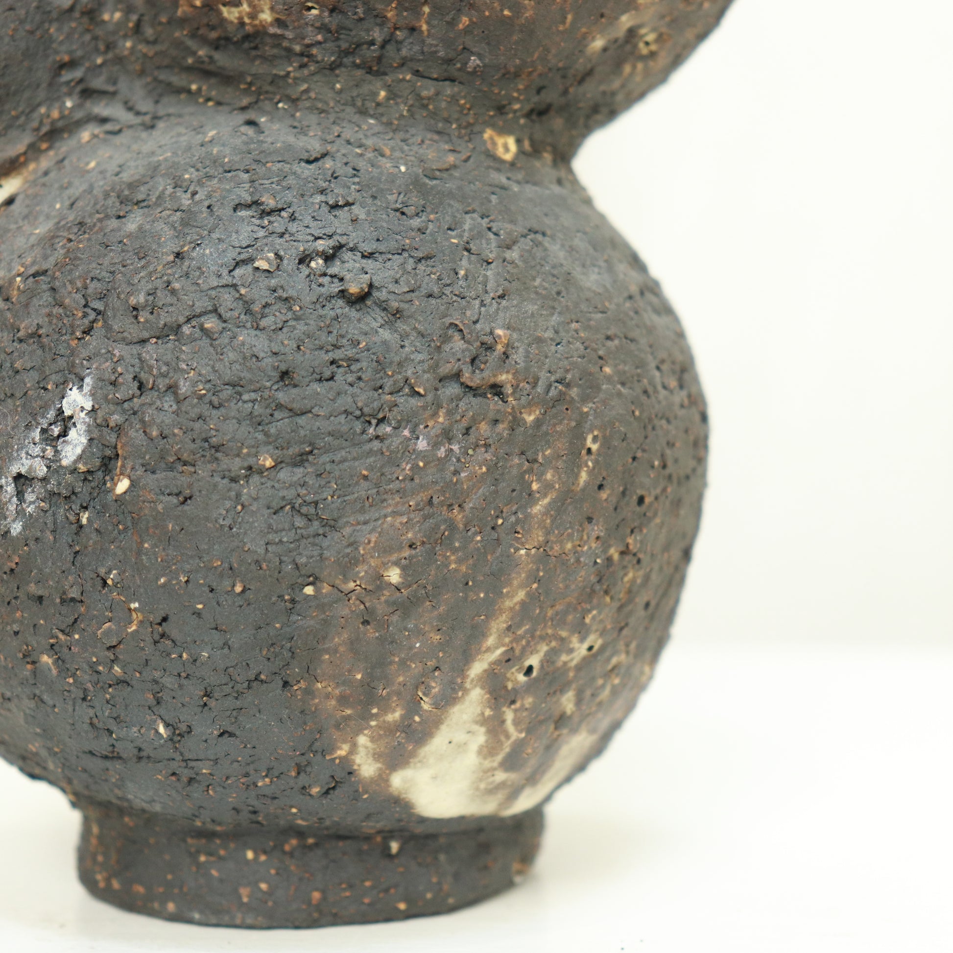 Detail of organic bulb formation on studio-made vase
