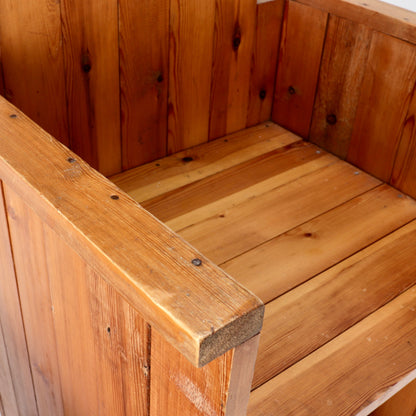 Close-up of plank construction and patinated arm.