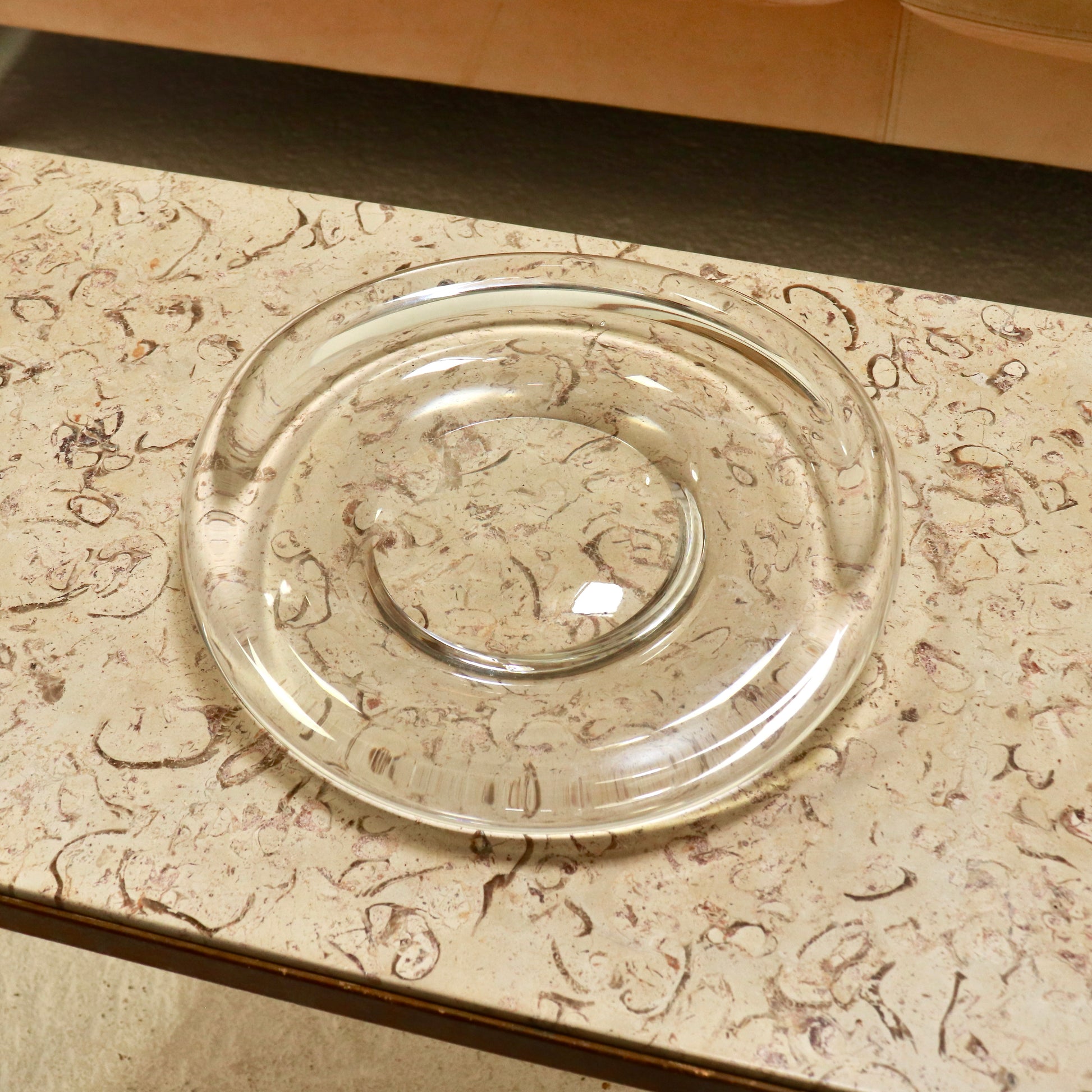 Danish glass centrepiece displayed on marble-top table