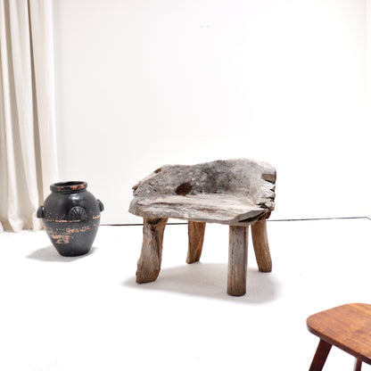 Primitive carved wood chair