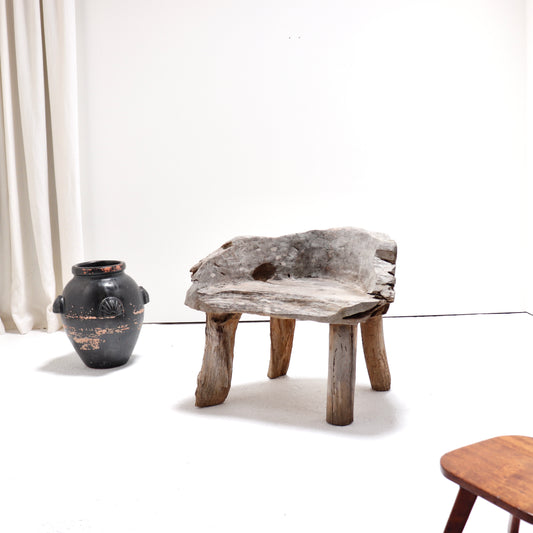 Primitive carved wood chair