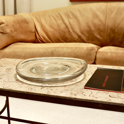 Danish mid-century heavy sculptural glass dish on table