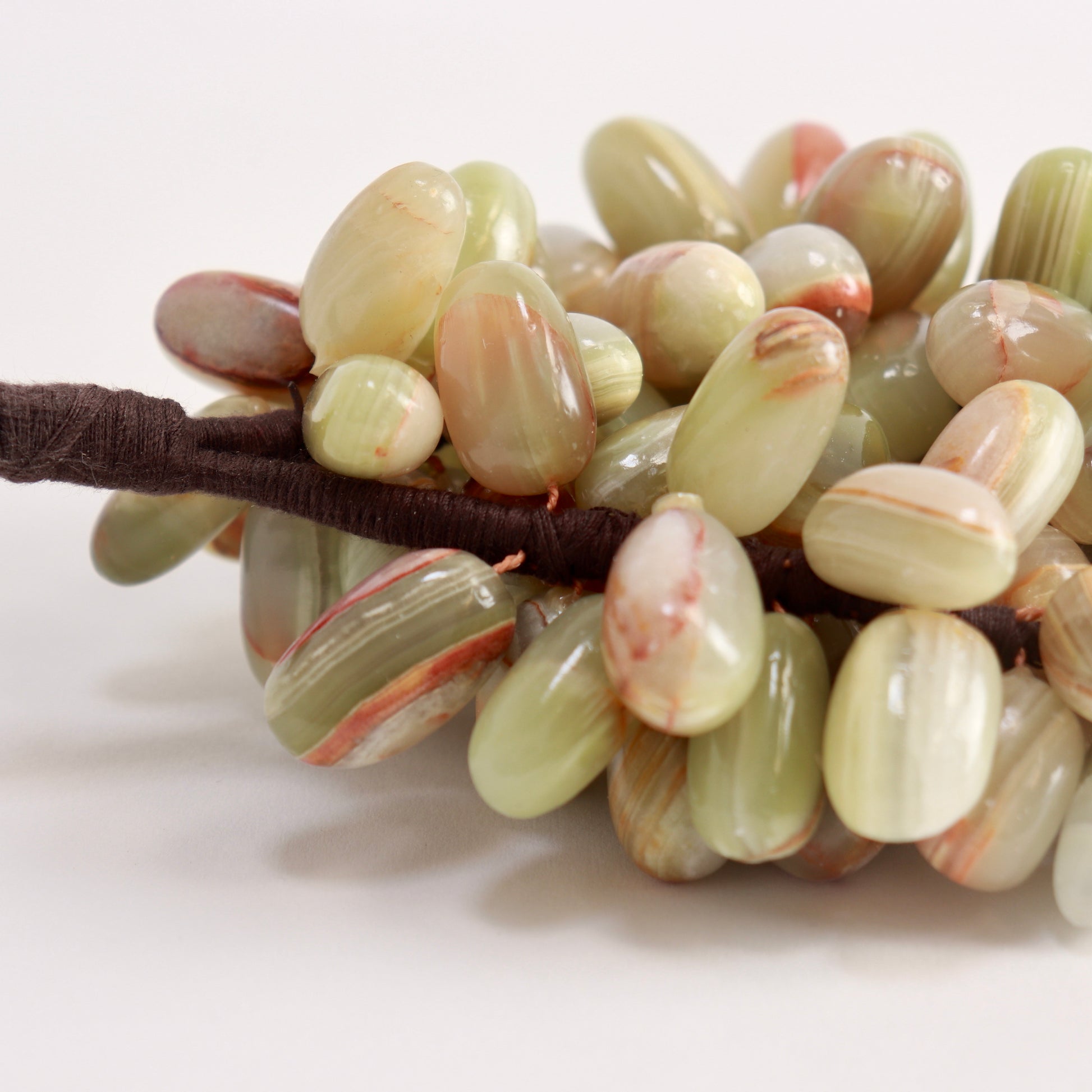 Close-up of natural veining in carved stone grapes