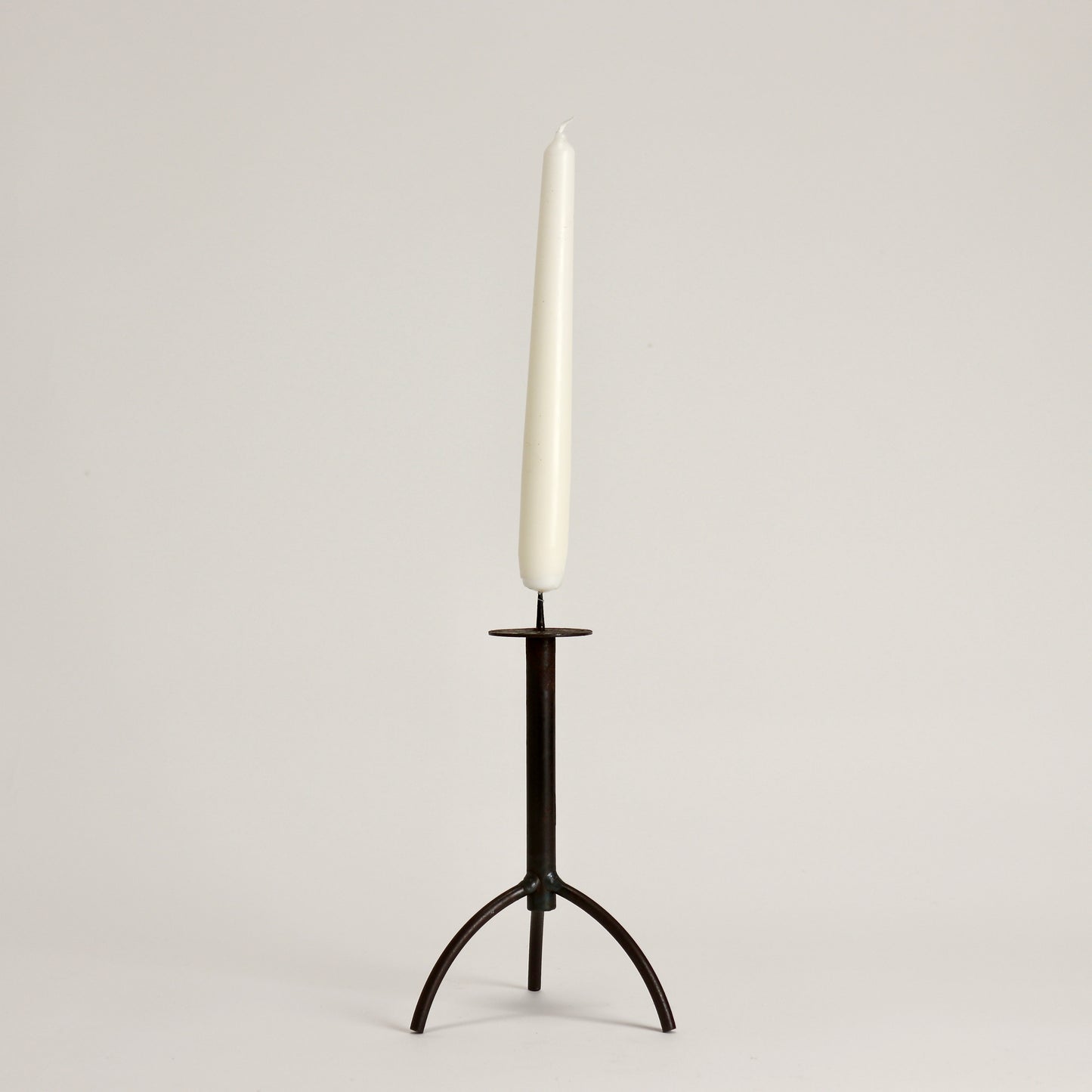 small brutalist iron pricket candlestick tripod base