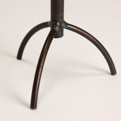 diminutive brutalist candle holder tripod legs
