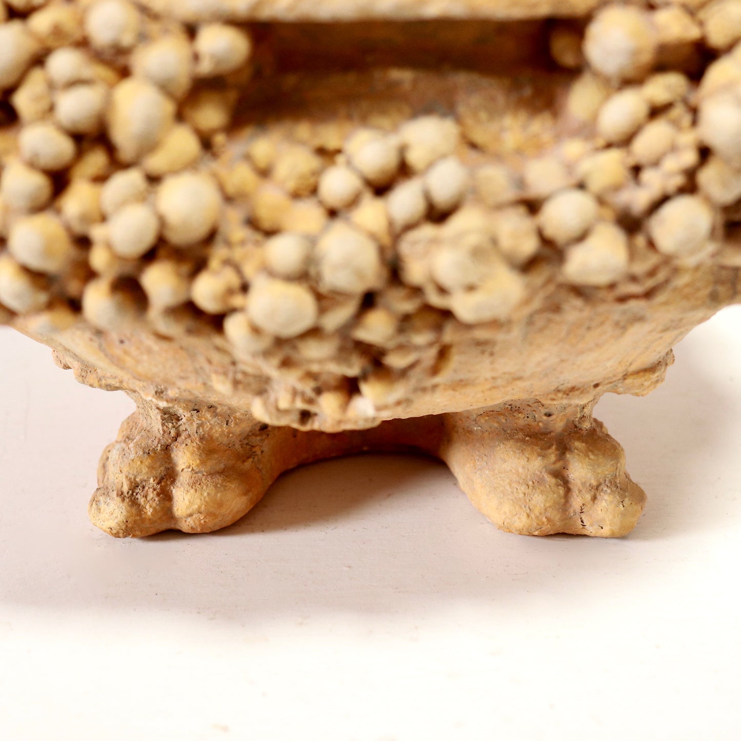 Side detail of encrusted clusters and footed base.