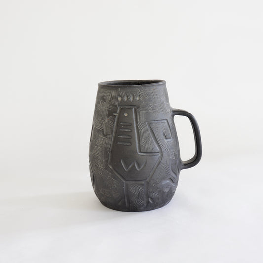 Decorative handled vessel