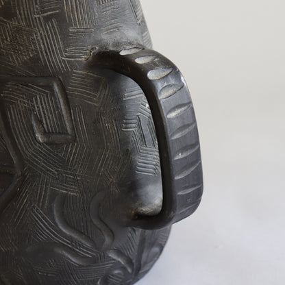 Decorative handled vessel